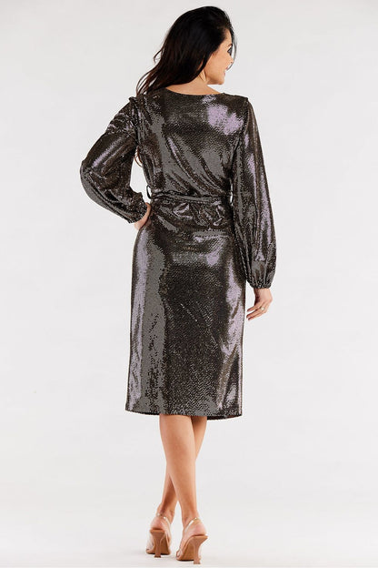 Back view of a luxurious metallic evening dress showcasing its stylish crinkled sleeves and elegant belt, ideal for glamorous events.