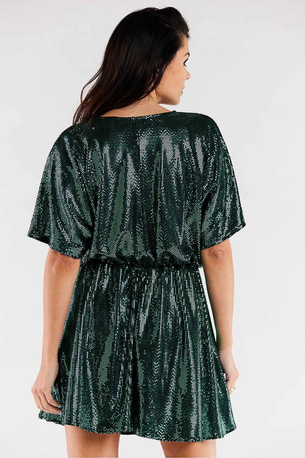 Elegant flared evening dress in shimmering green, showcasing a flattering sweetheart neckline and comfortable elastic waist. Ideal for special occasions.