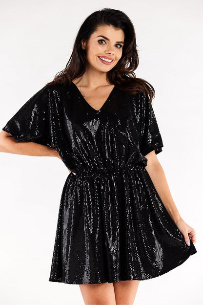 Stunning black evening dress adorned with sequins, featuring a V-neckline and a comfortable elastic waist for an effortlessly chic appearance.