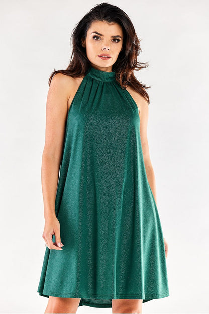 Stunning green flared evening dress featuring a luxurious neckline, perfect for an elegant evening out.