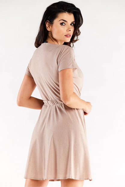 Sophisticated back view of an elegant short flared evening dress by Awama, showcasing its decorative creases and comfortable elastic fit, perfect for special occasions.