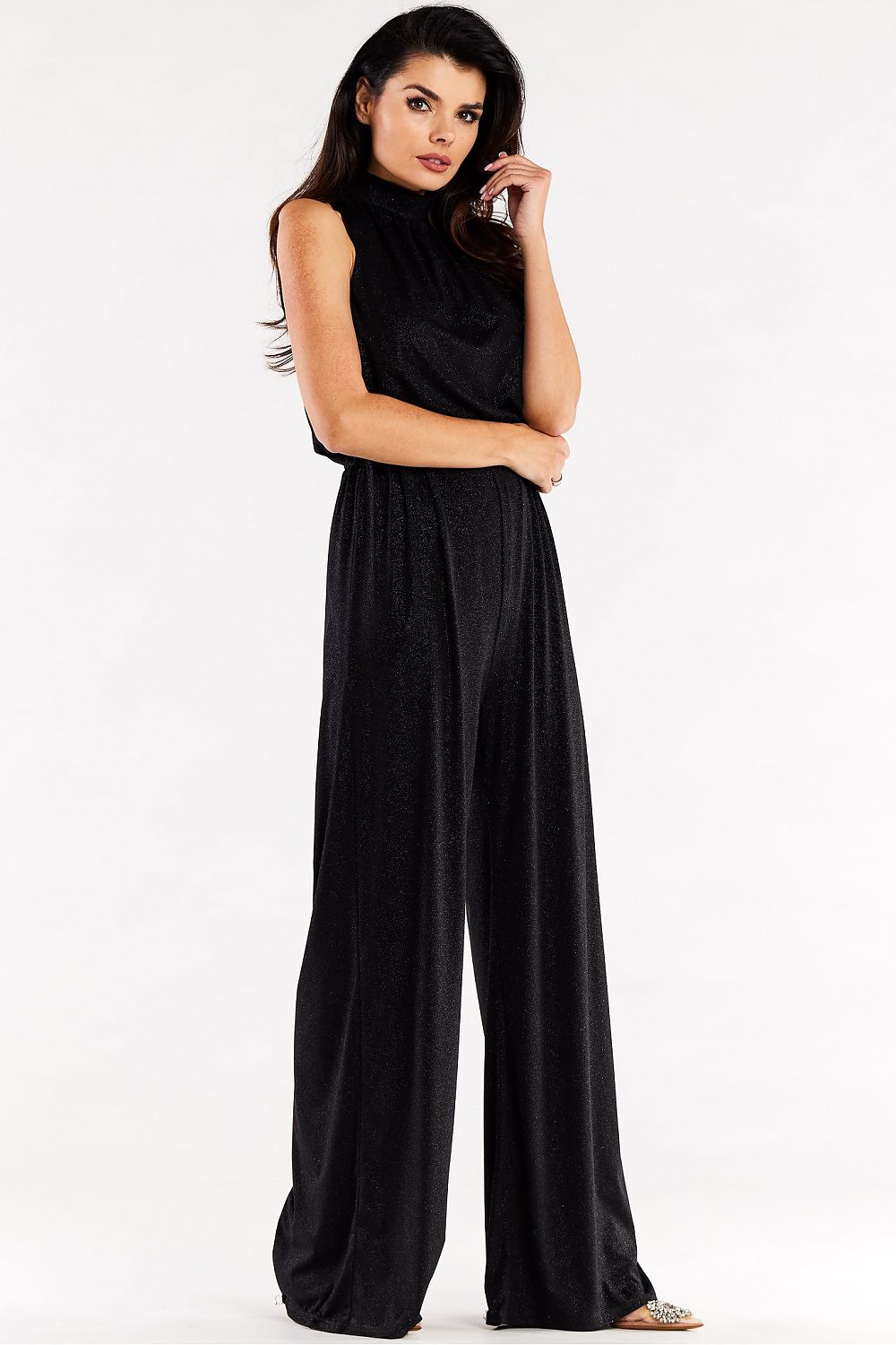 Sophisticated black wide-leg suit by Awama, showcasing a stylish crinkled neckline and a flattering silhouette on a model, perfect for upscale occasions.