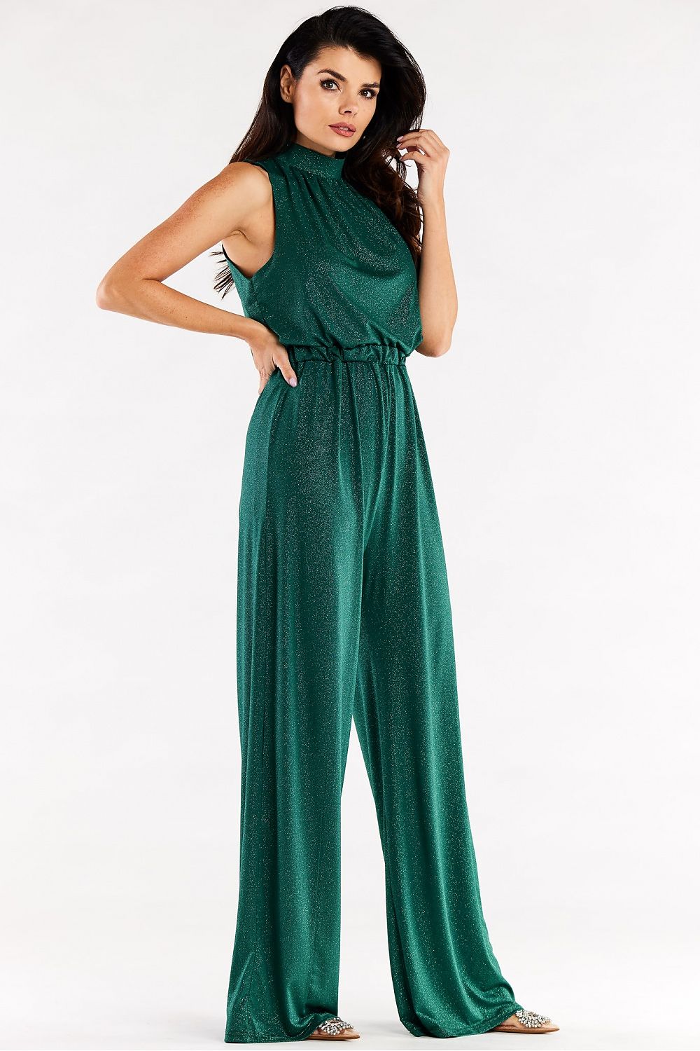 Chic green wide-leg suit with crinkled neckline and flowing silhouette, perfect for glamorous occasions.