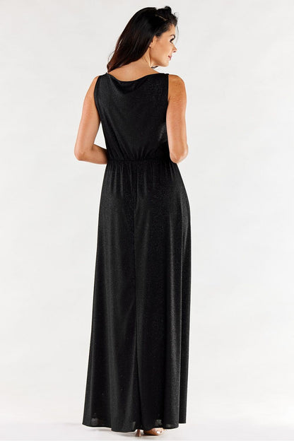 Back view of an elegant long black dress with ruffled neckline and side slit, highlighting its luxurious design and comfortable fit.