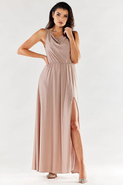 Chic long dress in soft pink with ruffled neckline and stylish side slit, embodying elegance for any special event.