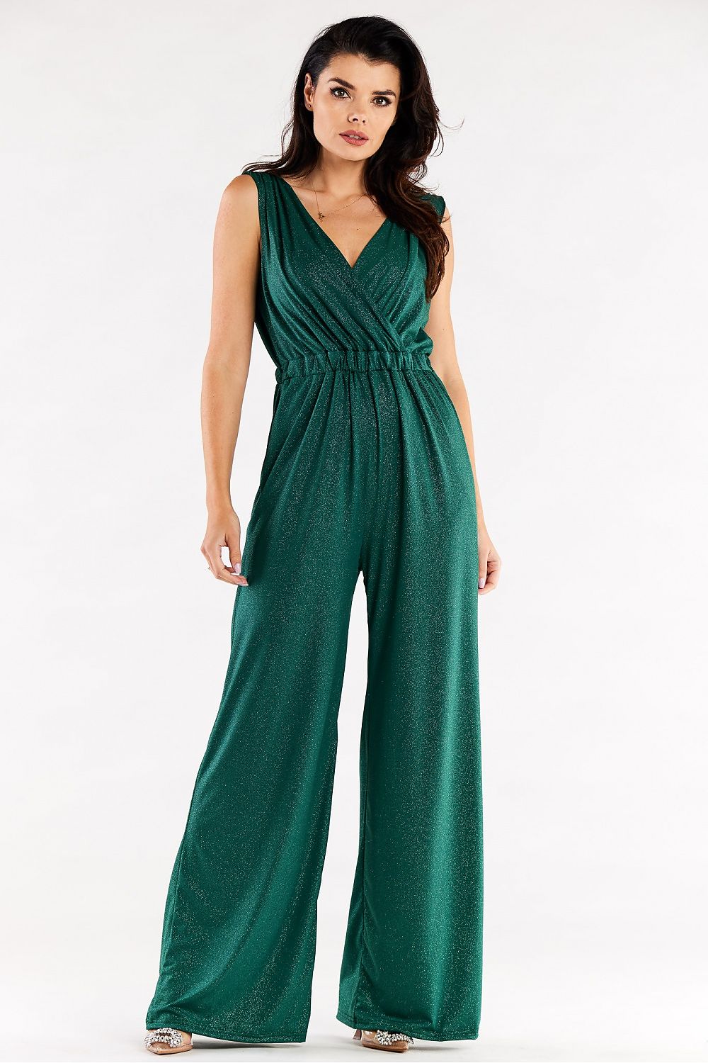 Elegant green wide leg jumpsuit with envelope top, featuring a flattering V-neck and cinched waist, designed for a luxurious look.