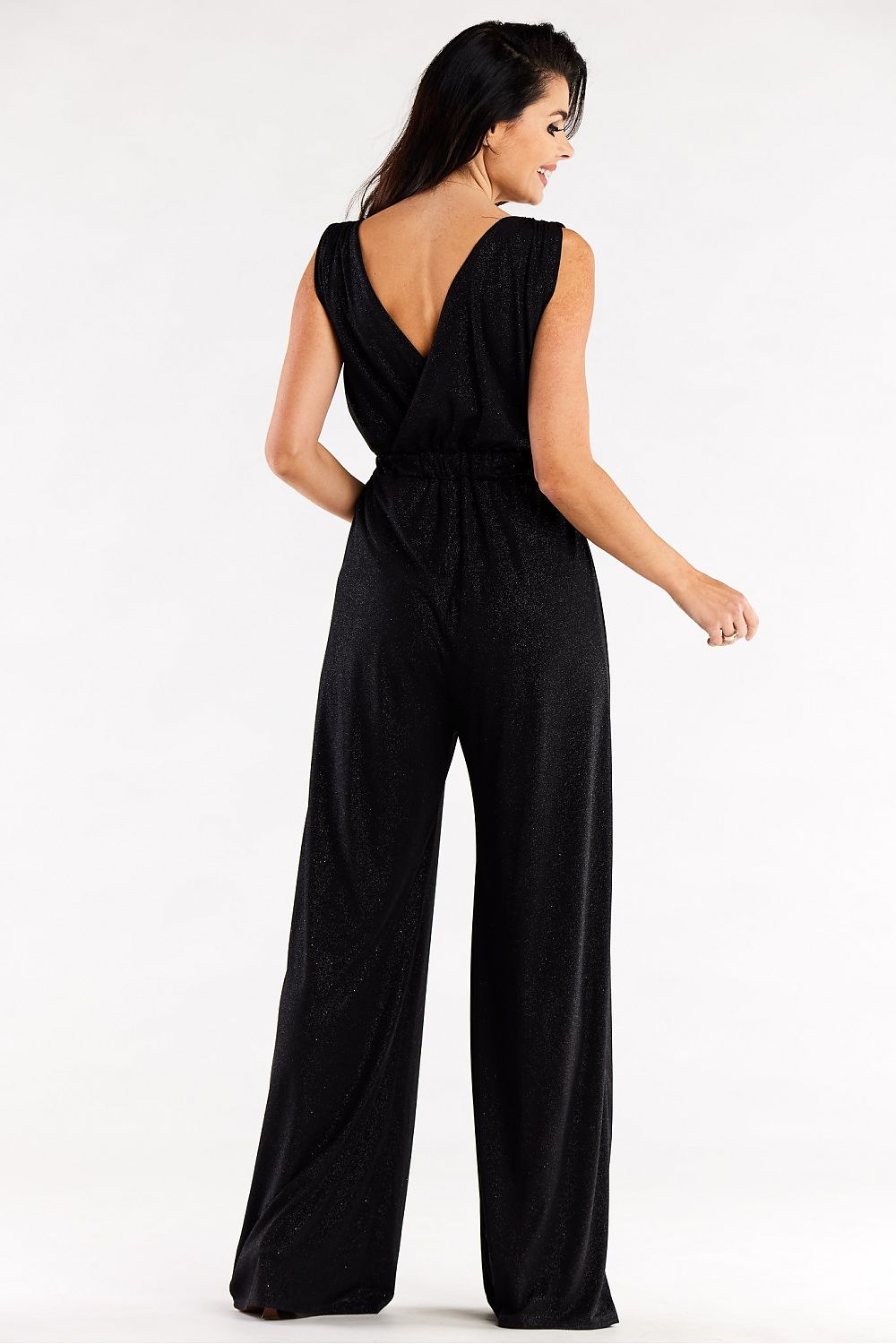 Elegant wide leg jumpsuit with envelope top in black, showcasing a back view with a stylish cut and wide elastic waistband, perfect for a sophisticated evening look.