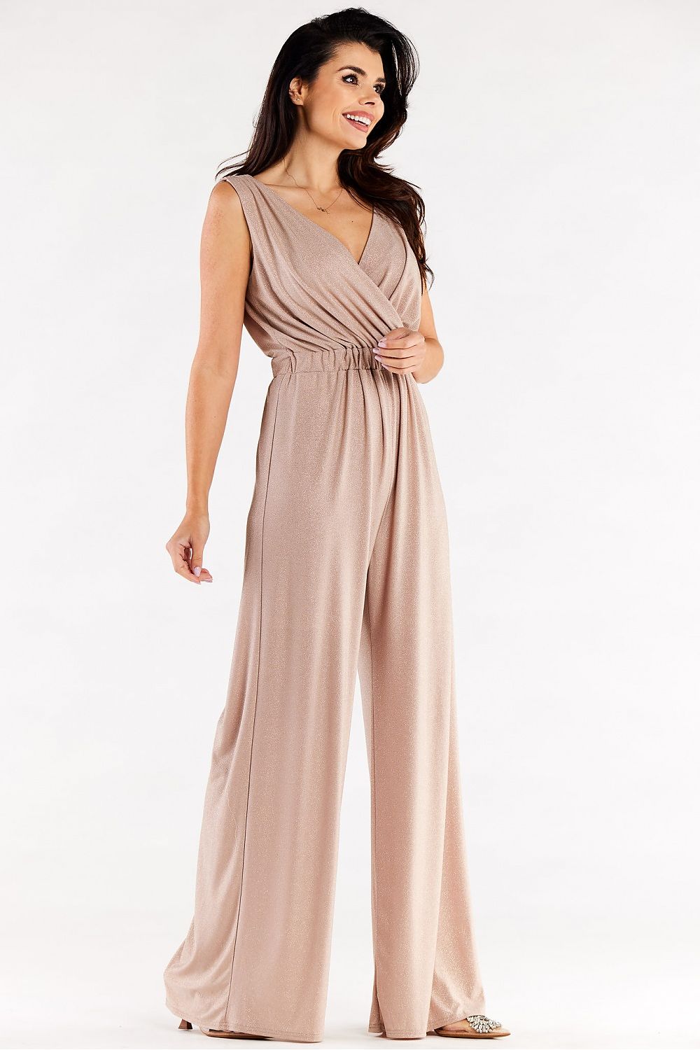 Gorgeous beige wide leg jumpsuit showcasing a flattering wrap top, captured in a bright front view, perfect for a fashionable and elegant ensemble.
