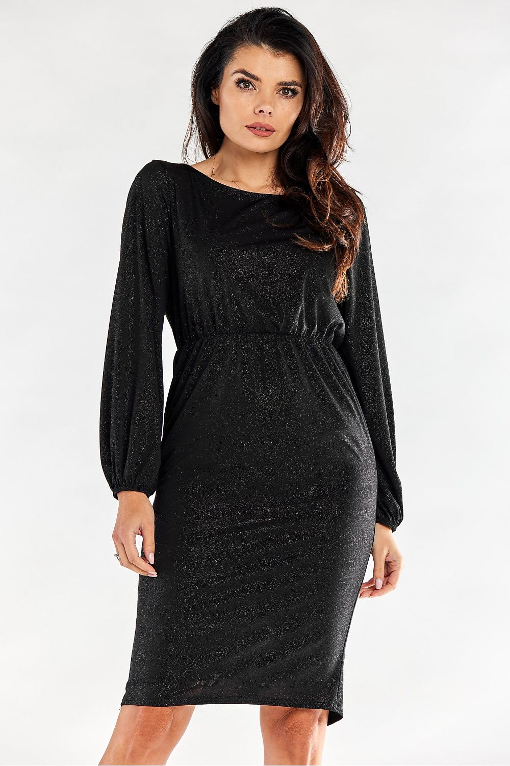 Chic black evening dress designed with long sleeves and a flattering fit, embellished with a subtle shimmer for a glamorous appearance.