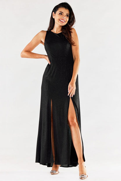 Chic black long dress by Awama, designed with flattering front slits and a fitted bodice, embodying elegance for formal events.