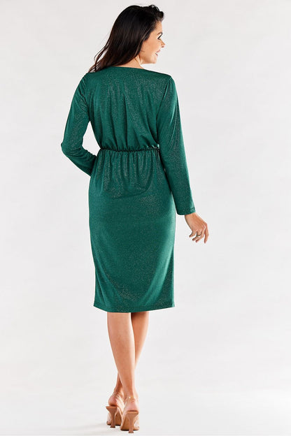 Back view of a sophisticated green envelope dress, demonstrating a chic elastic waistband and long sleeves, perfect for classy occasions.