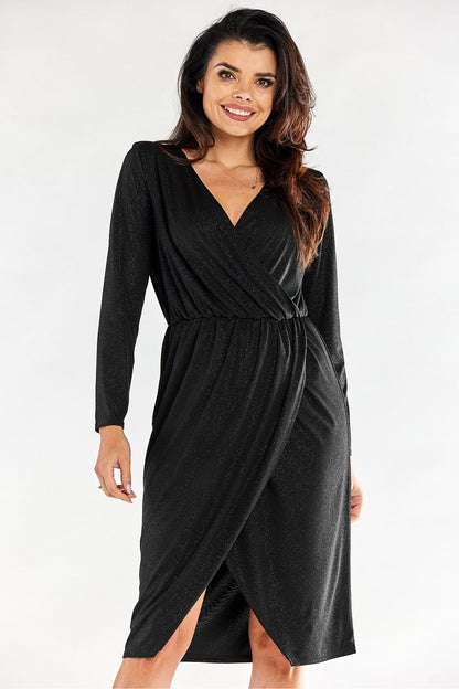Elegant black envelope dress with elastic waistband, featuring long tapered sleeves, perfect for sophisticated occasions.