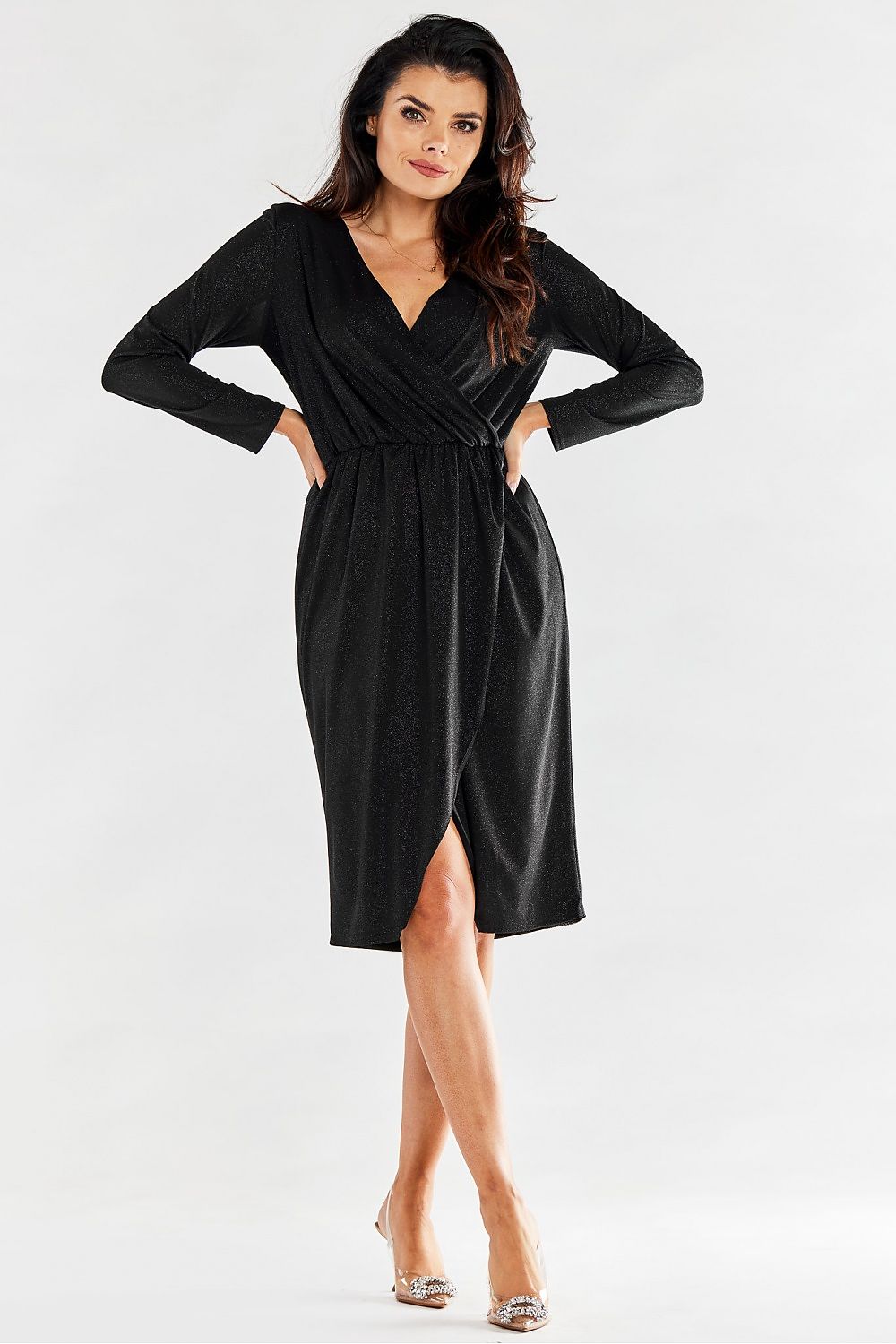Stunning black envelope dress showcased elegantly, highlighting the wrap style and flattering silhouette, ideal for evening wear.