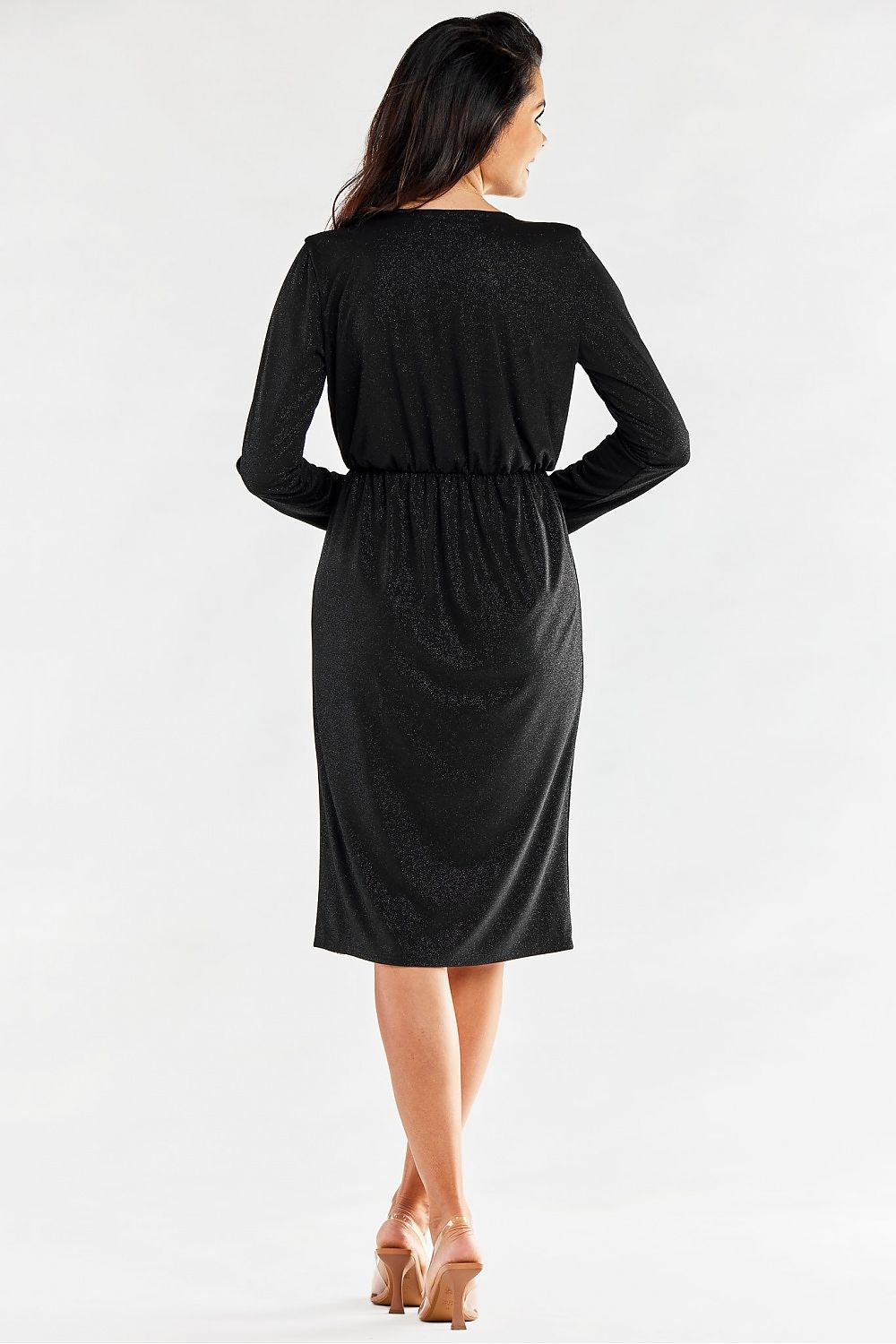 Back view of a luxurious black envelope dress, emphasizing the elastic waistband and graceful flow for refined style.