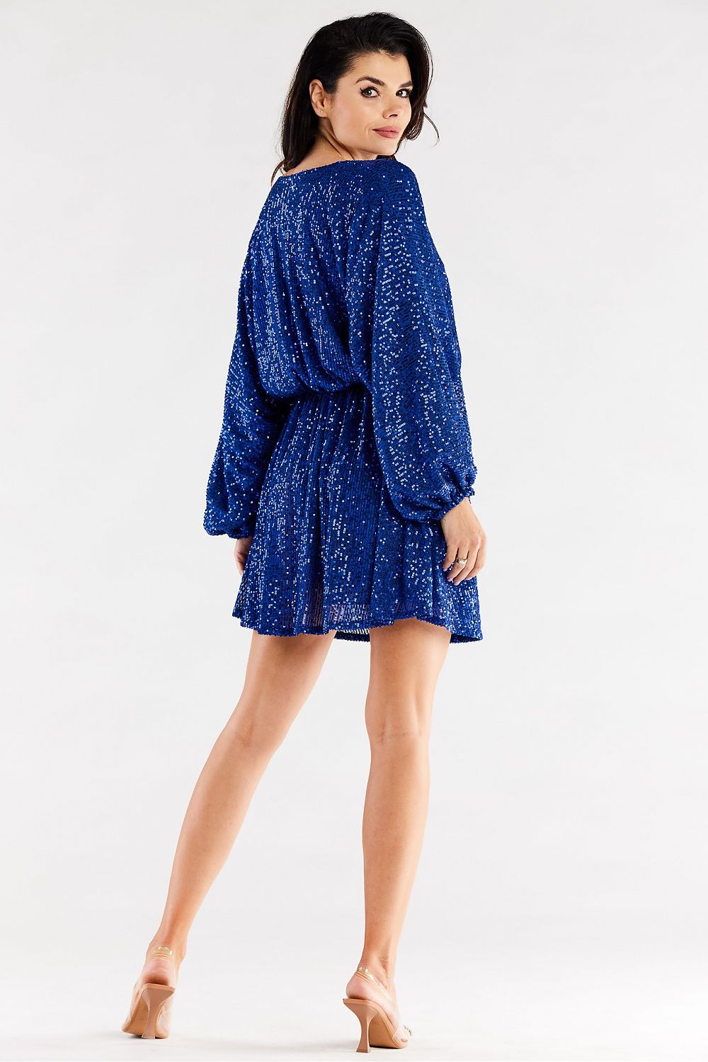 Elegant blue evening dress designed by Awama, featuring a cheeky neckline and wide sleeves, showcasing a stylish back view. Ideal for special occasions, this trendy dress is made in Poland with a flattering elastic waist. Perfect for luxe styling.