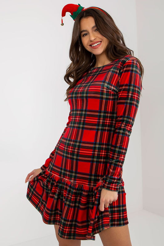 Luxurious checkered velour daydress in red and black with decorative frill, model showcasing the design and stylish fit.