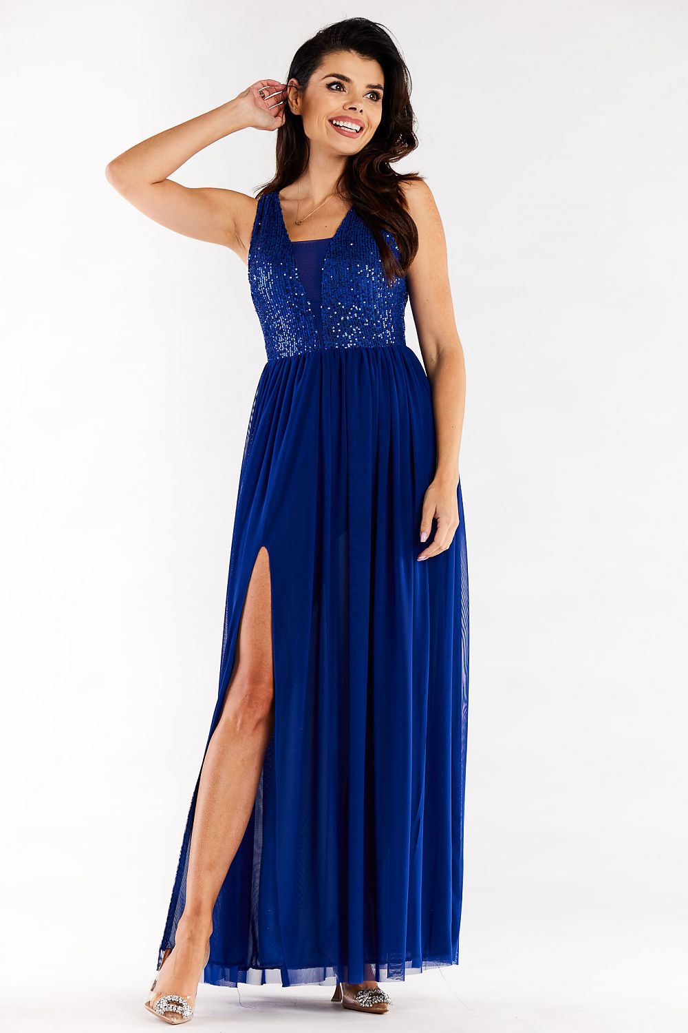 Sophisticated blue long dress by Awama, featuring a sequined top and high slit, ideal for sophisticated evening events.