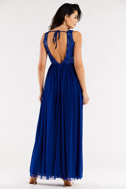 Back of the elegant blue dress by Awama, revealing the chic open back design decorated with sequins, perfect for special occasions.