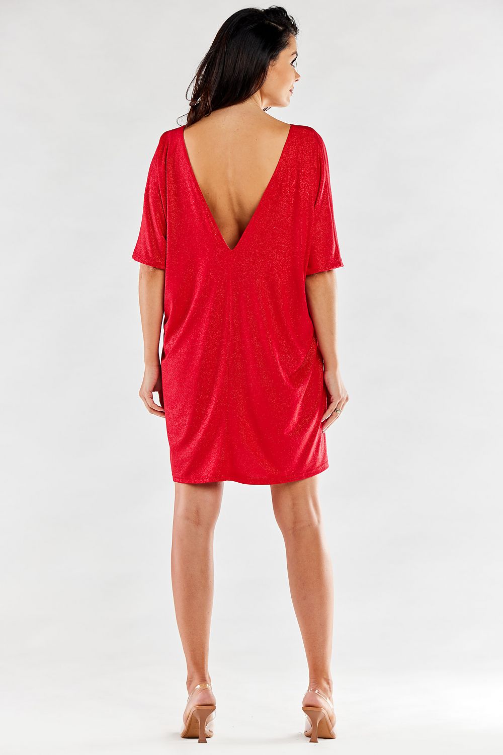 Back view of a luxurious red loose evening dress with a deep V-neckline, highlighting its graceful silhouette and versatile elegance.