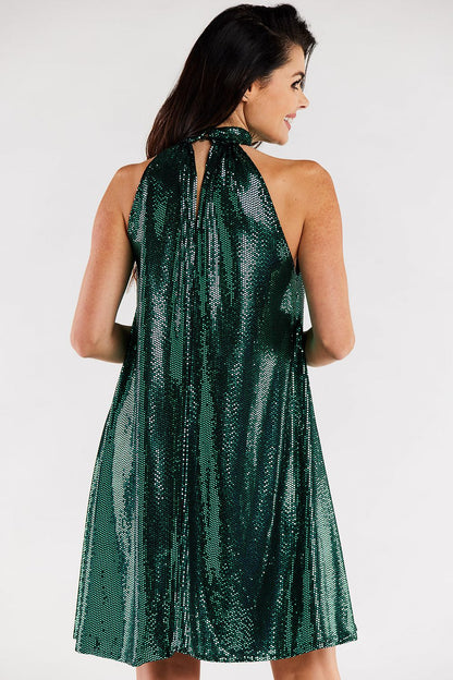 Elegant loose flared evening dress in shimmering green with a ruffle neckline, showcased from the back, perfect for upscale occasions.