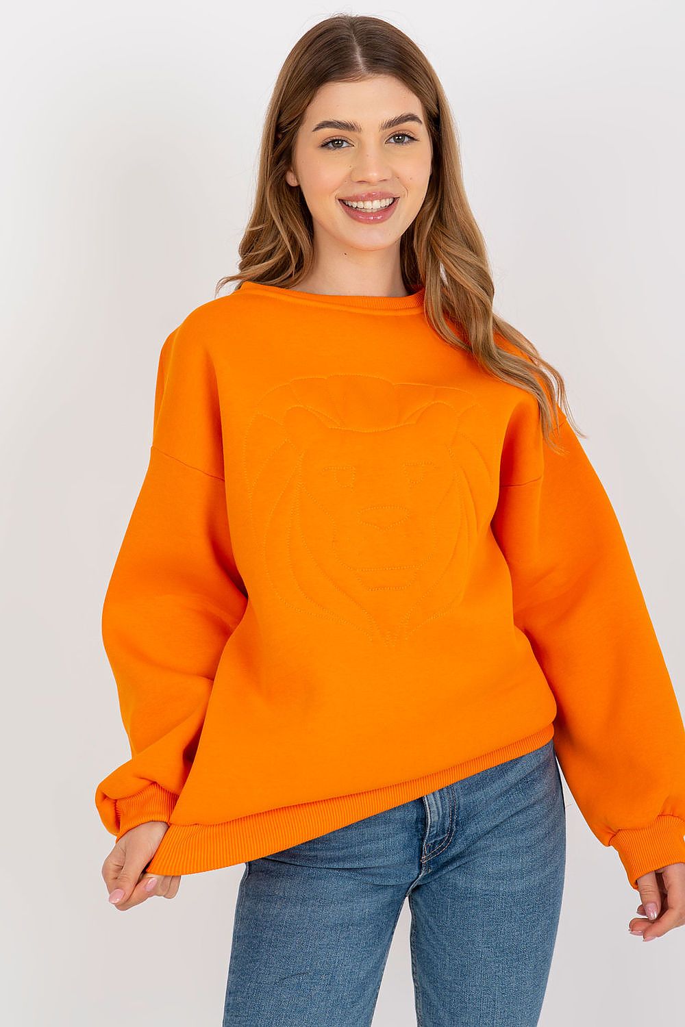 Luxurious ladies' long sleeve sweatshirt in vibrant orange, featuring an elegant embroidered lion design on the front, complemented by a relaxed fit and round neckline, perfect for a stylish casual look.