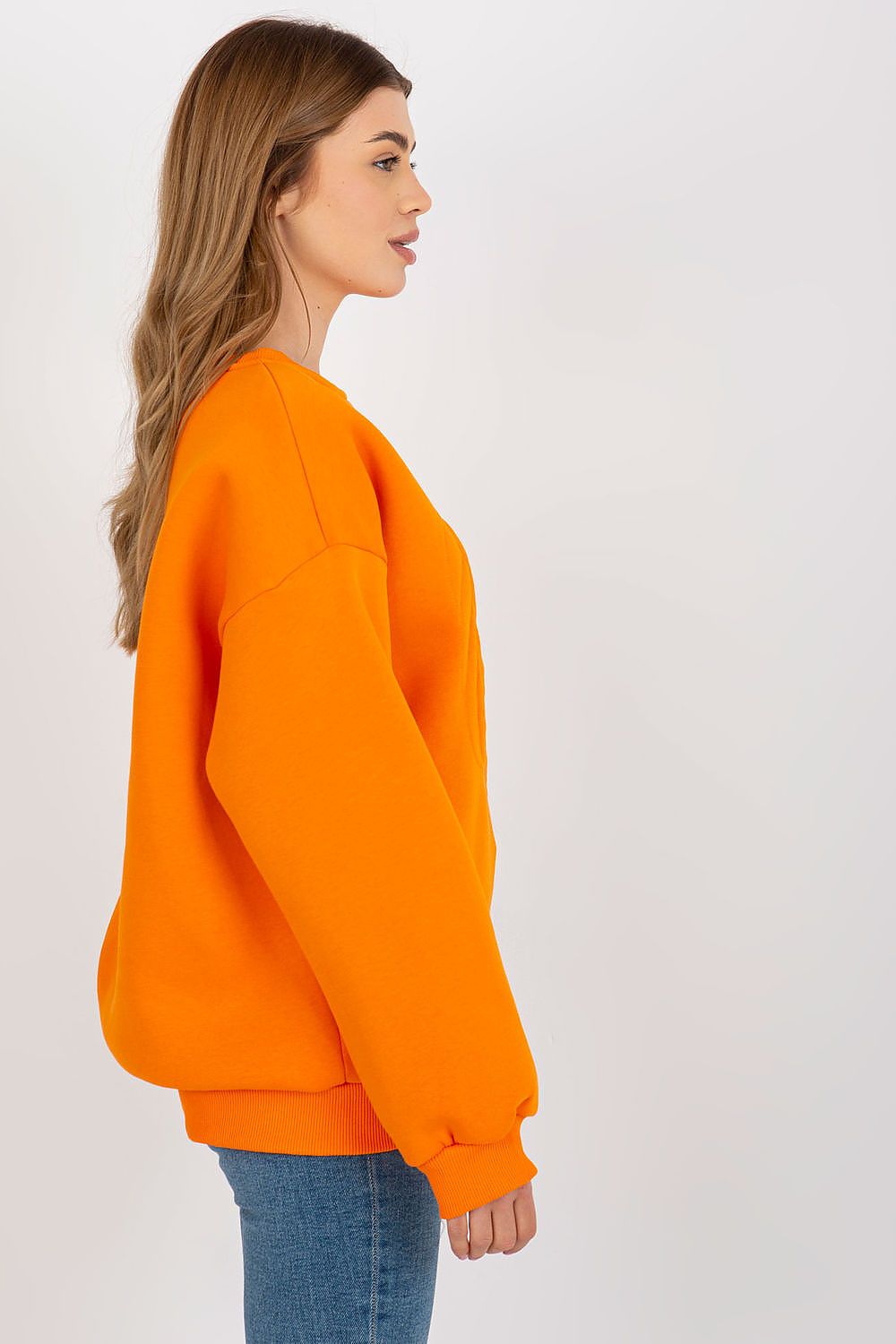 Elegant side view of an orange long sleeve embroidered sweatshirt, showcasing a relaxed fit and round neckline, perfect for casual luxury styling.