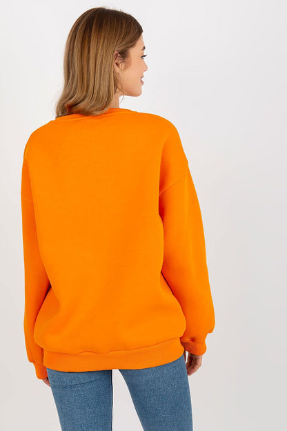 Chic back view of a vibrant orange long sleeve sweatshirt, featuring a comfortable design that blends style and sophistication.