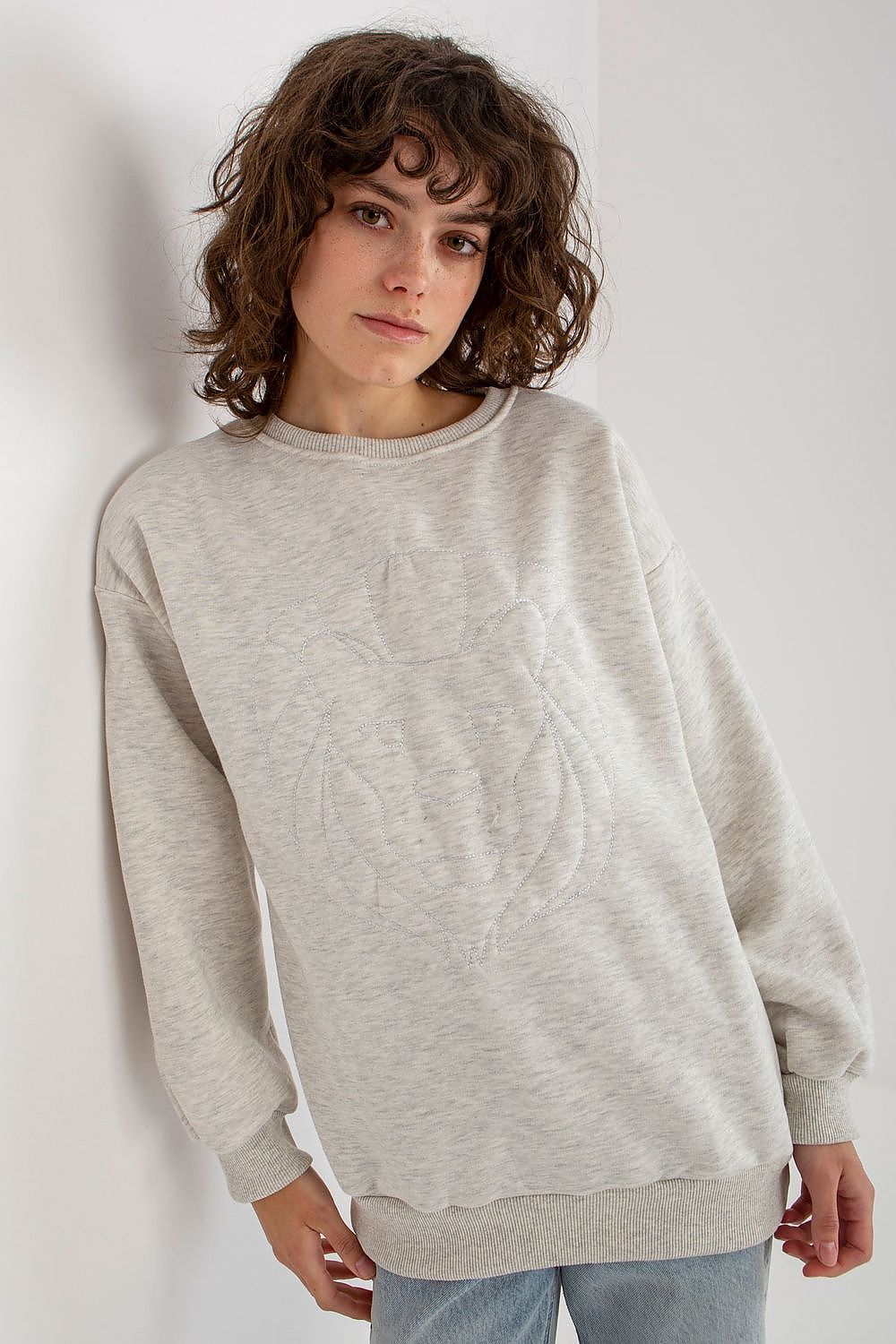 Elegant ladies' long sleeve sweatshirt in light grey with intricate embroidery, showcasing a relaxed silhouette, perfect for a luxurious casual wear ensemble.