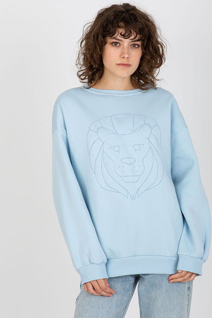 Sophisticated blue sweatshirt with embroidered lion design, crafted for a unique and fashionable look, designed for the modern woman's wardrobe.