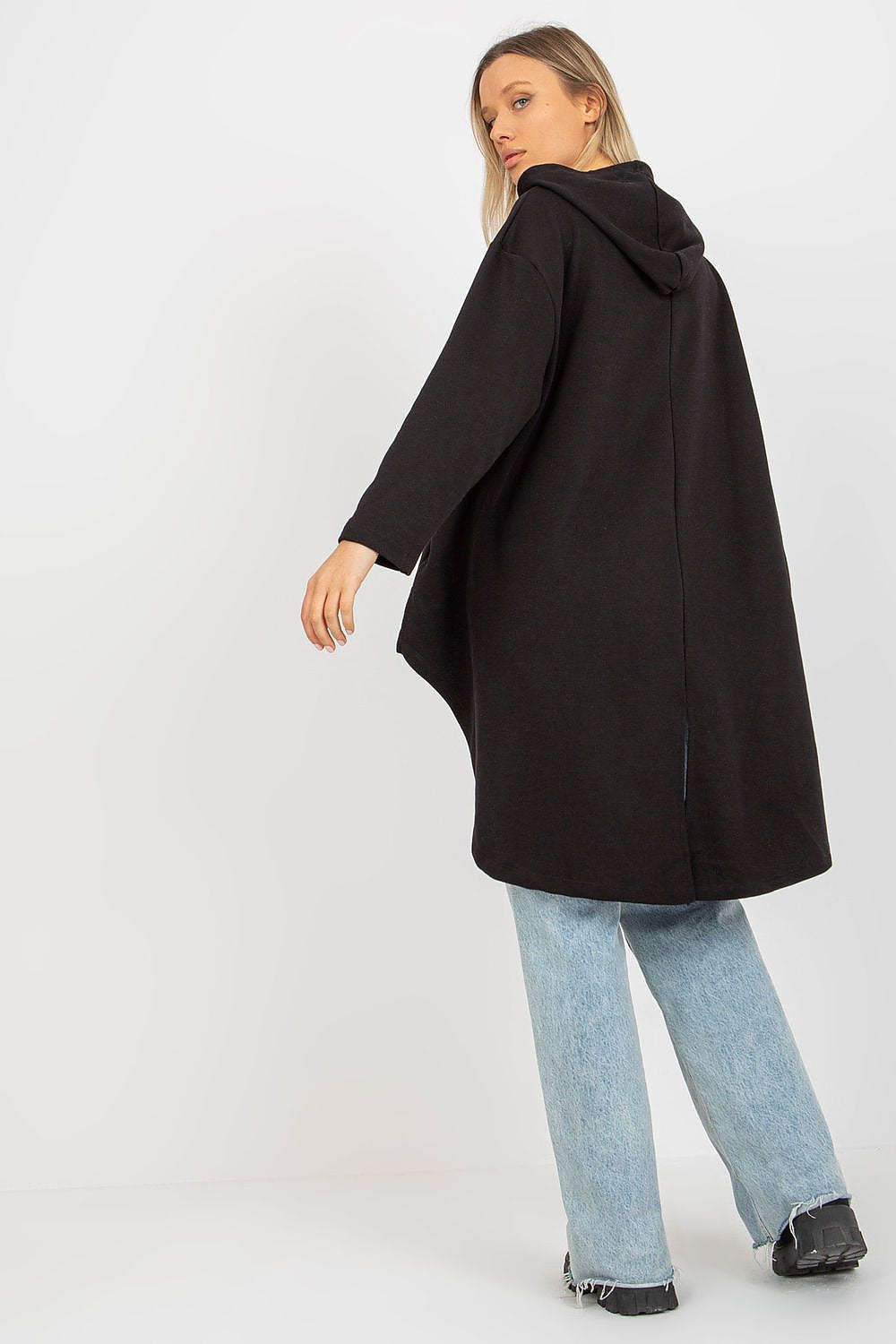 Chic women's hoodie sweatshirt designed with an asymmetrical hem, displayed from the back to highlight its fashion-forward silhouette and cozy design, perfect for casual luxury.