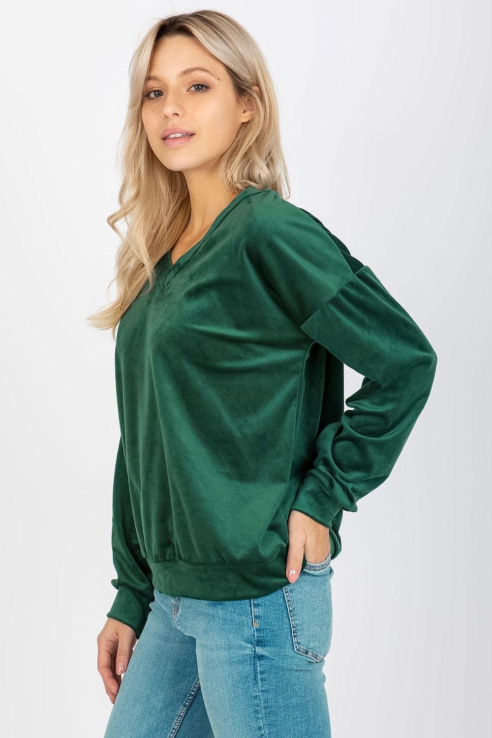 Elegant women's velour sweatshirt in vibrant green, designed with a heart neckline and perfect for leisurely outings.