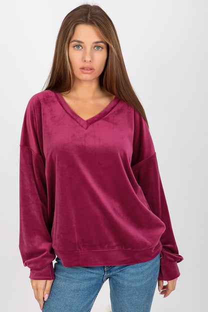 Sophisticated women's velour sweatshirt in rich burgundy, showcasing a V-neck design and long sleeves for an upscale casual look.