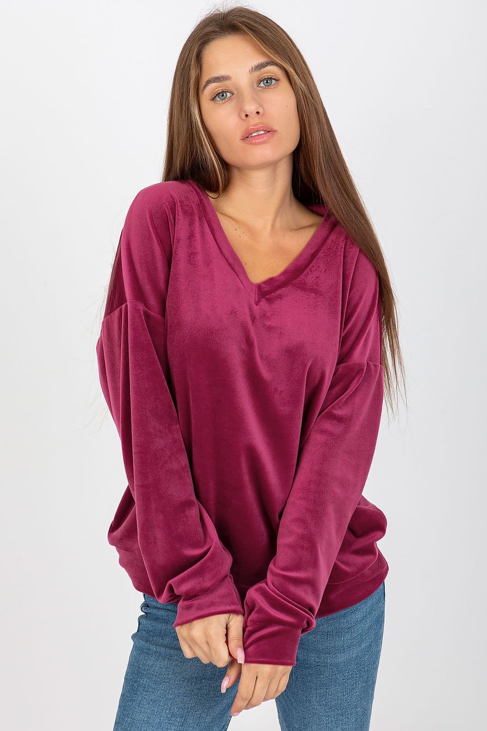 Fashion-forward women's velour sweatshirt in deep burgundy, designed with a flattering V-neckline and comfortable silhouette for a luxe feel.