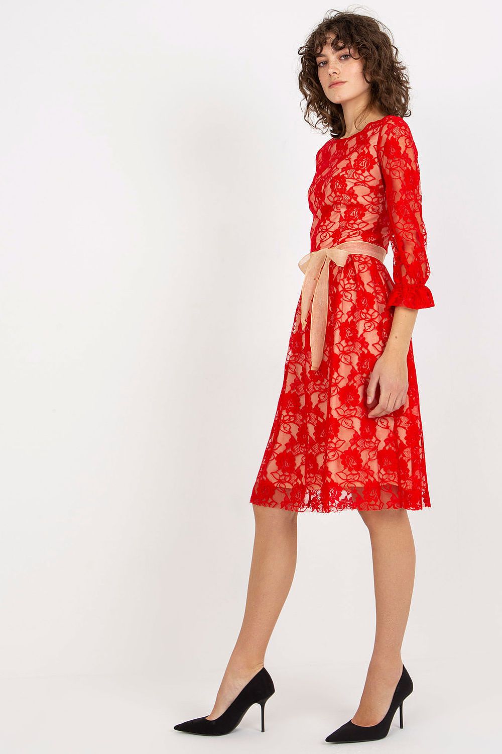 Stylish red lace evening gown with 3/4 sleeves and a delicate waist sash, embodying elegance and grace for special occasions.