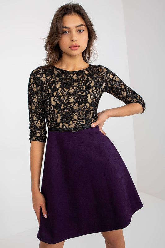 Elegant evening dress featuring a black lace top and vibrant purple skirt, styled with a buckled belt, perfect for formal occasions.