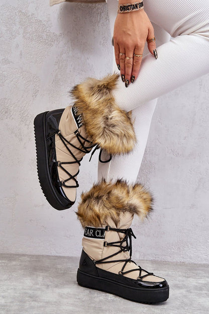 Trendy cold-resistant winter snow boots, showcasing a plush fur collar and a robust platform, perfect for fashionable winter adventures.