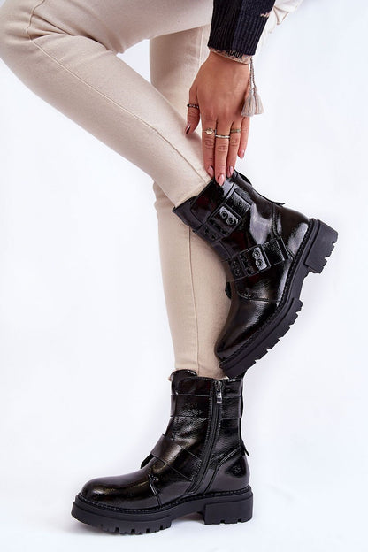 Fashionable La.Fi women's eco leather boots with side zippers, paired with fitted cream trousers, showcasing a luxurious boot design.