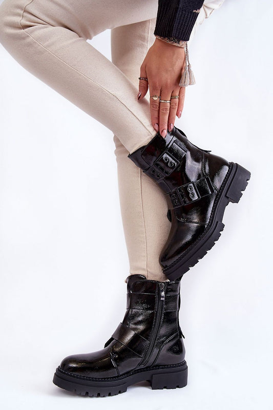 Fashionable La.Fi women's eco leather boots with side zippers, paired with fitted cream trousers, showcasing a luxurious boot design.