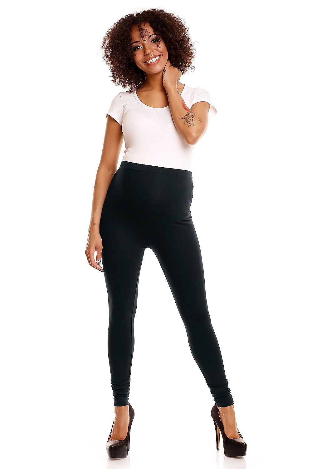 Stylish black maternity leggings presented by a cheerful pregnant model, showcasing tummy support and a blend of luxury and comfort.