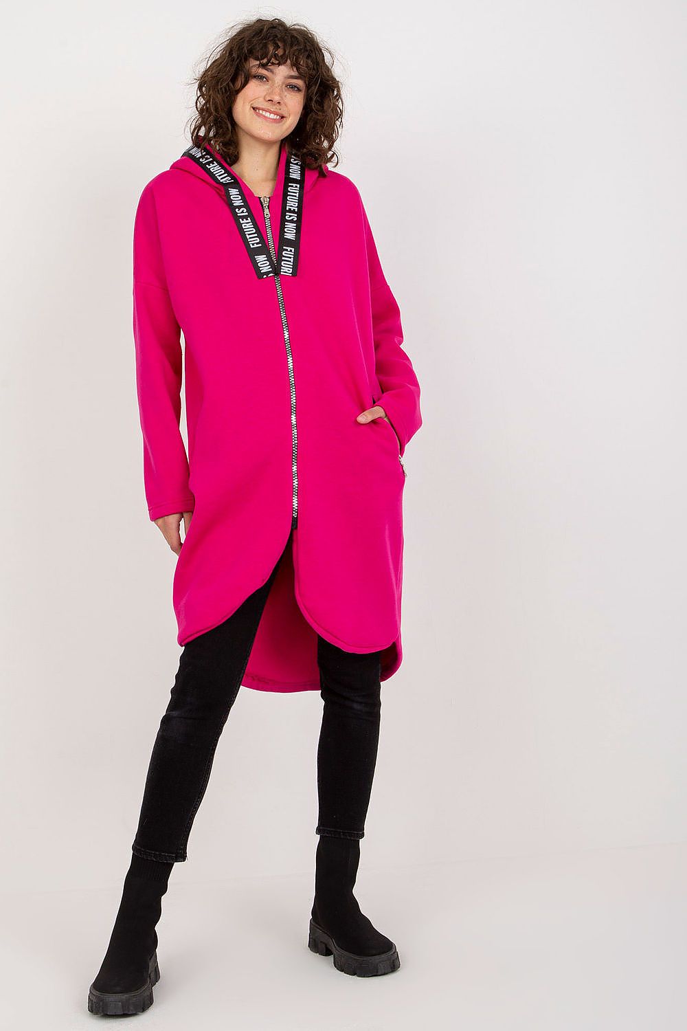 Chic pink zippered hooded sweatshirt for women, featuring an extended cut and sleek zip pockets, a perfect blend of style and comfort.