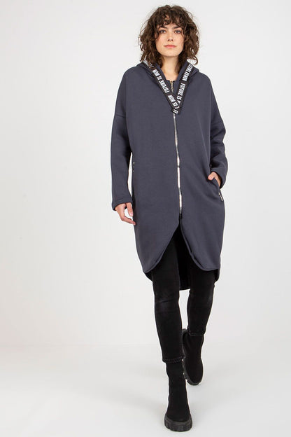 Elegant luxury women's zippered hooded sweatshirt in deep navy, showcasing a contemporary style with zippered pockets, worn confidently by a model.