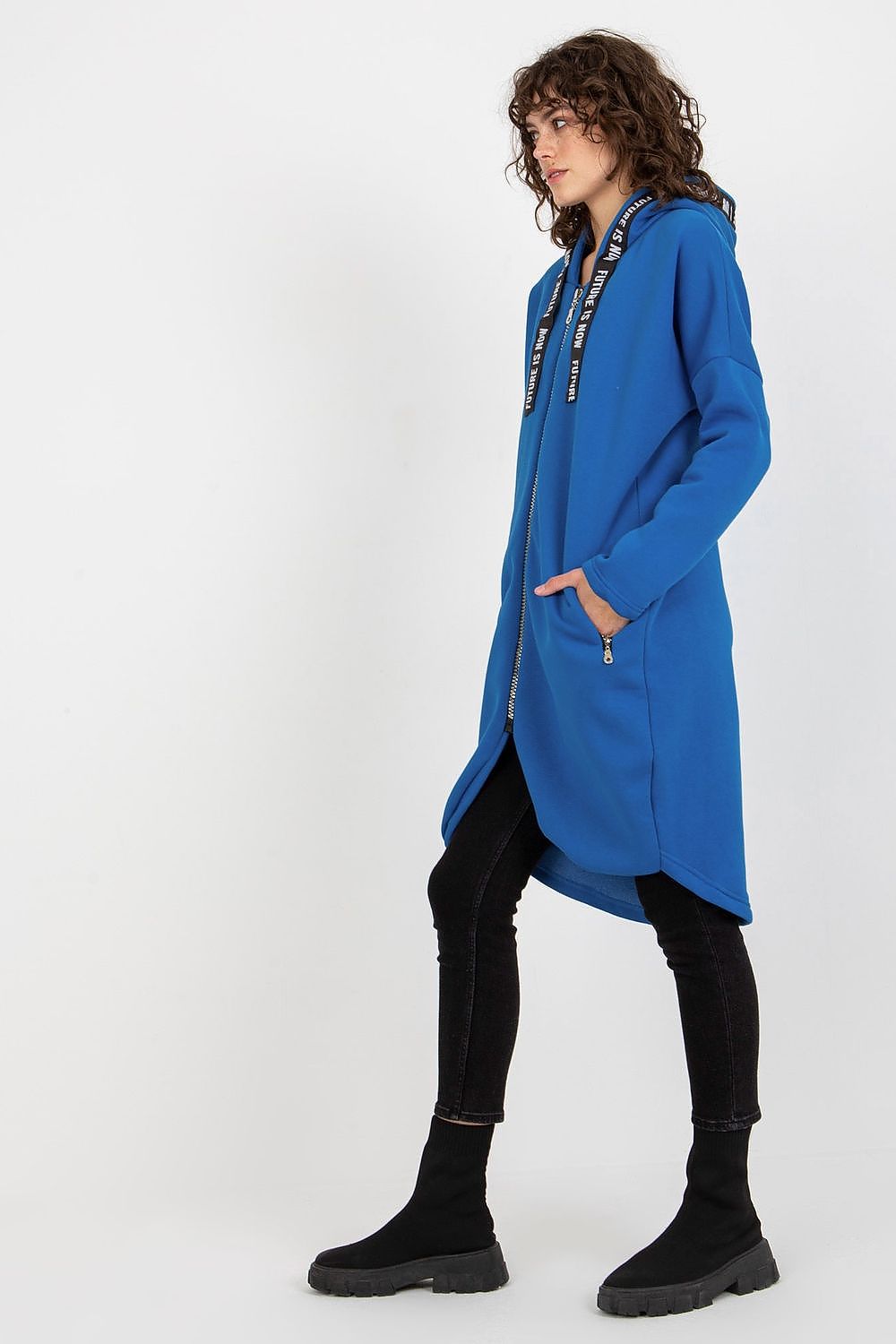 Stylish women's hooded sweatshirt in bold blue, featuring zippered detailing and an extended silhouette, designed for a luxe casual aesthetic.