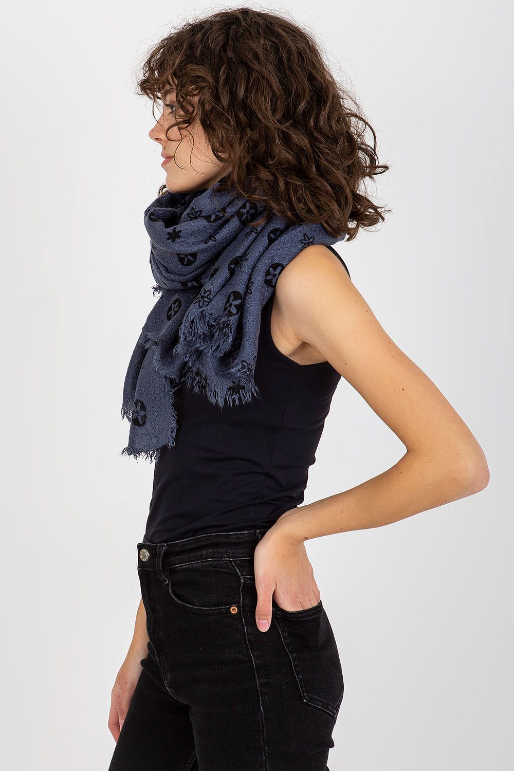 Side profile of a fashionable woman draped in a chic navy acrylic neckerchief, perfect for adding a touch of sophistication.