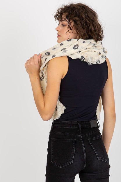 Model displaying a luxurious cream neckerchief in a fashionable pose, emphasizing its elegant design and 100% acrylic fabric.