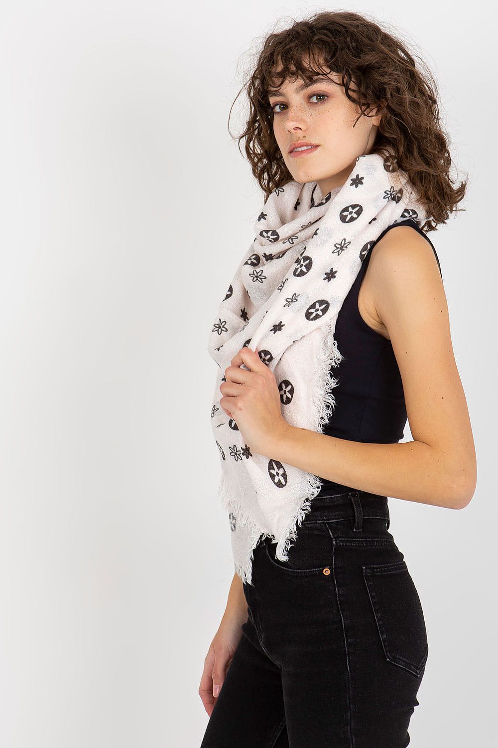 Profile view of a stylish model wearing a luxury floral-patterned neckerchief made from 100% acrylic, radiating elegance.