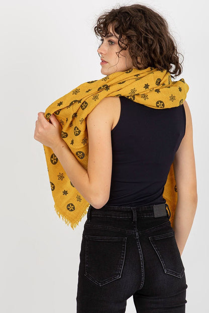 Model showcasing the mustard neckerchief styled elegantly around the neck, perfect for a sophisticated look.