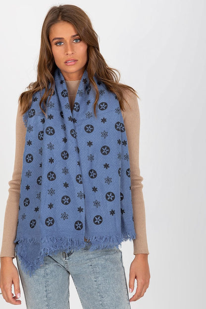 Chic blue neckerchief wrapped around the shoulders, displaying detailed printed patterns, offering a fresh luxury accessory.