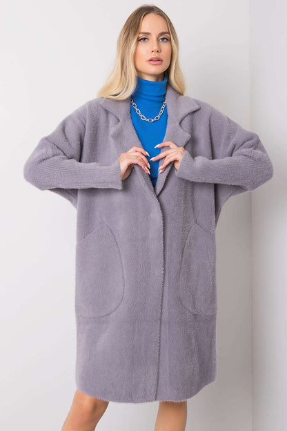 Charming front view of Women's MBM Angora Wool Blend Coat in sophisticated grey, elegantly layered over a blue turtleneck, showcasing its plush texture and stylish pockets.