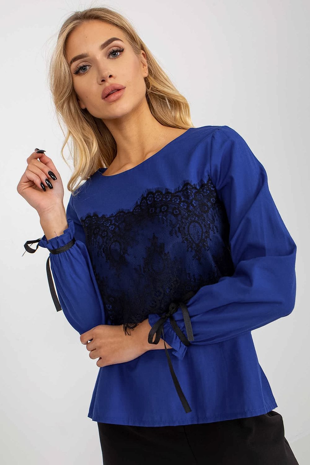Sophisticated blue luxury cotton blouse adorned with black lace and long sleeves, a perfect choice for upscale events.