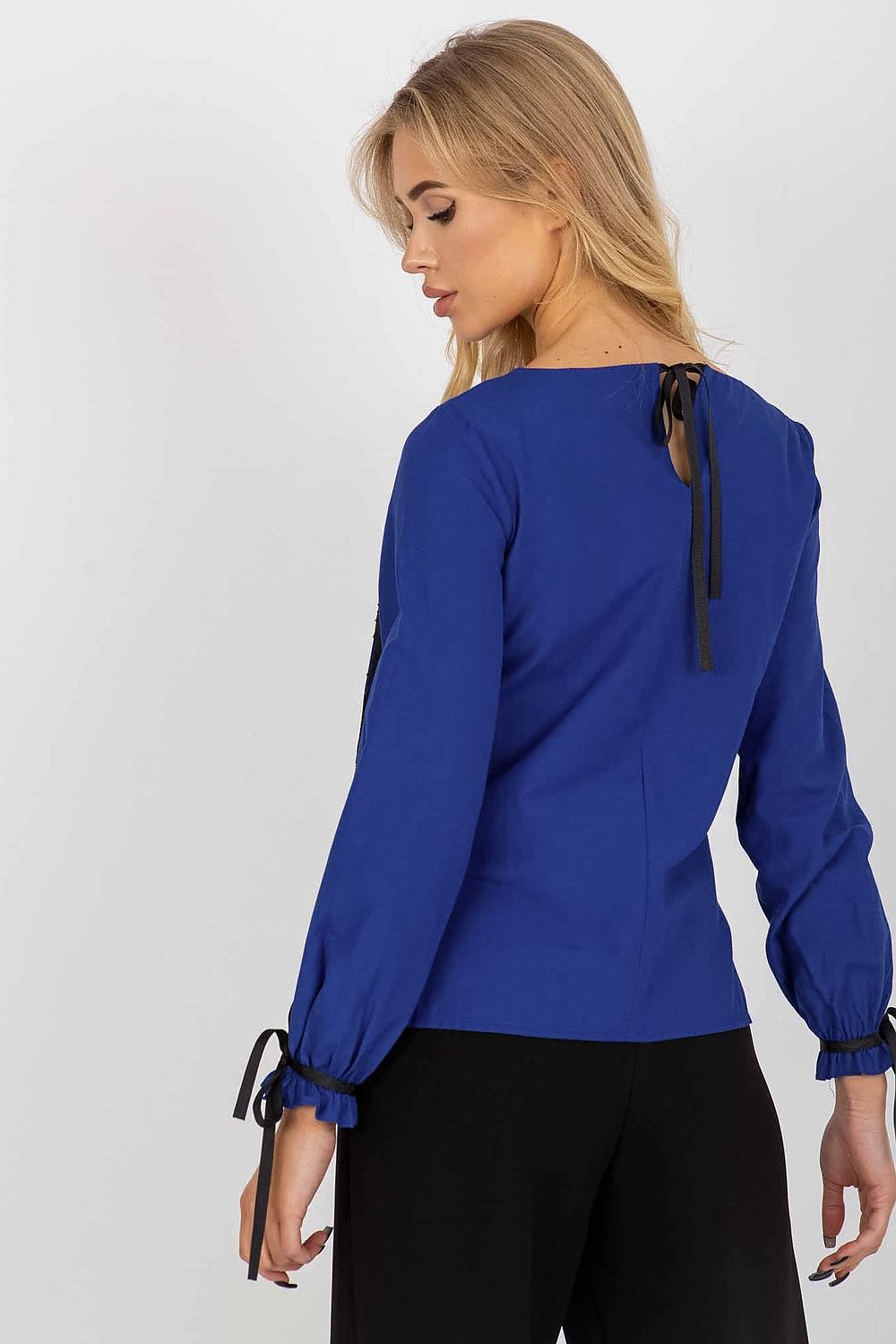 Elegant blue cotton blouse by Lakerta featuring long sleeves and a chic back tie detail, perfect for sophisticated occasions.